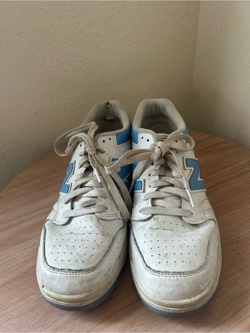 New Balance White Leather Sneakers with Light Blue Logo